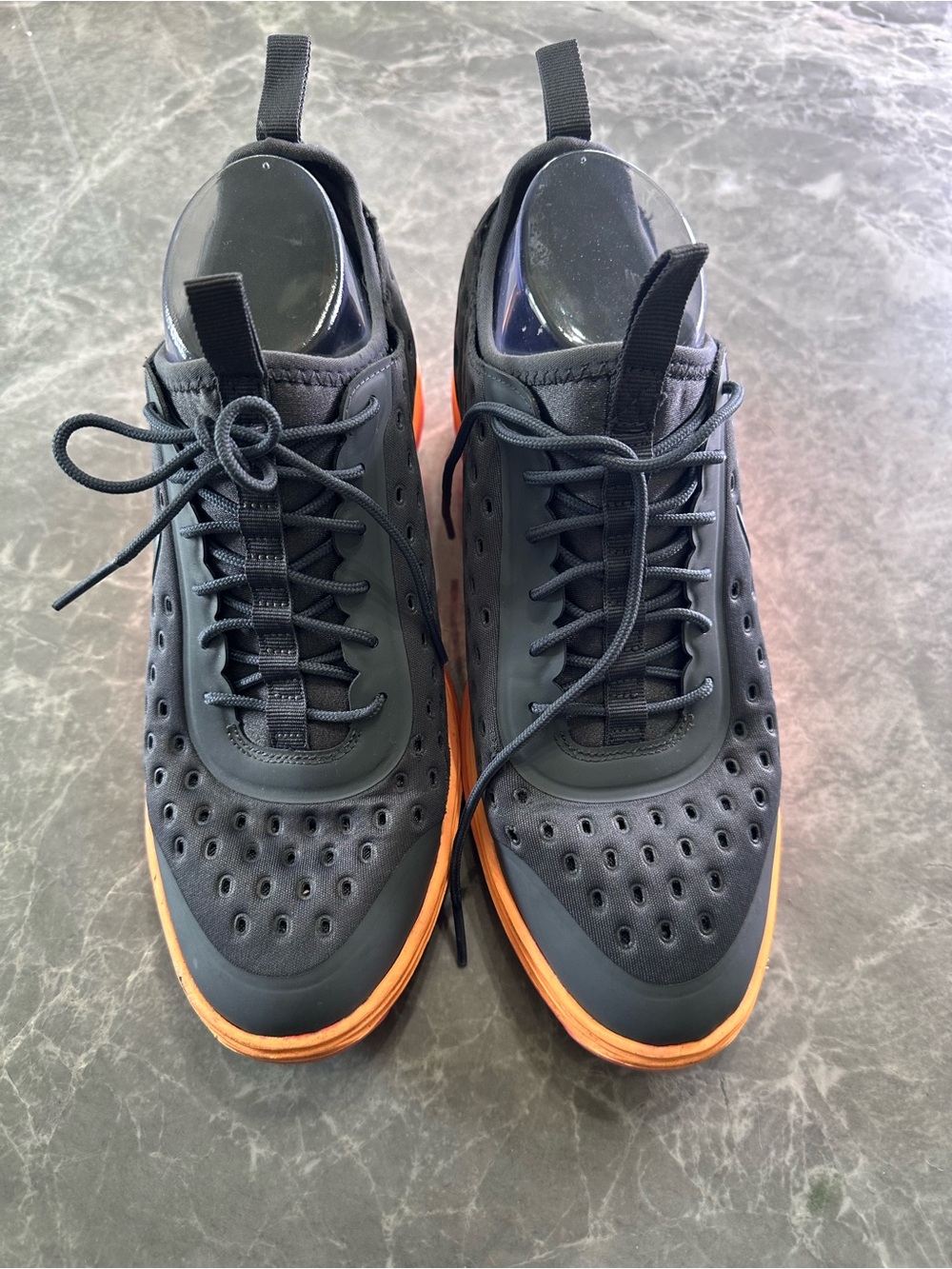 Nike Women's Black Sneakers with Orange Sole